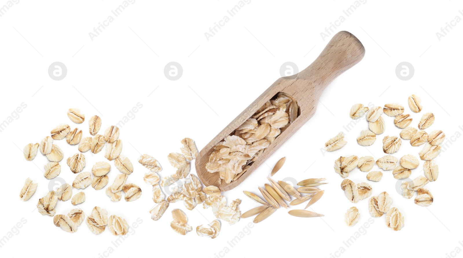 Image of Uncooked oatmeal and wooden scoop on white background, top view. Banner design 