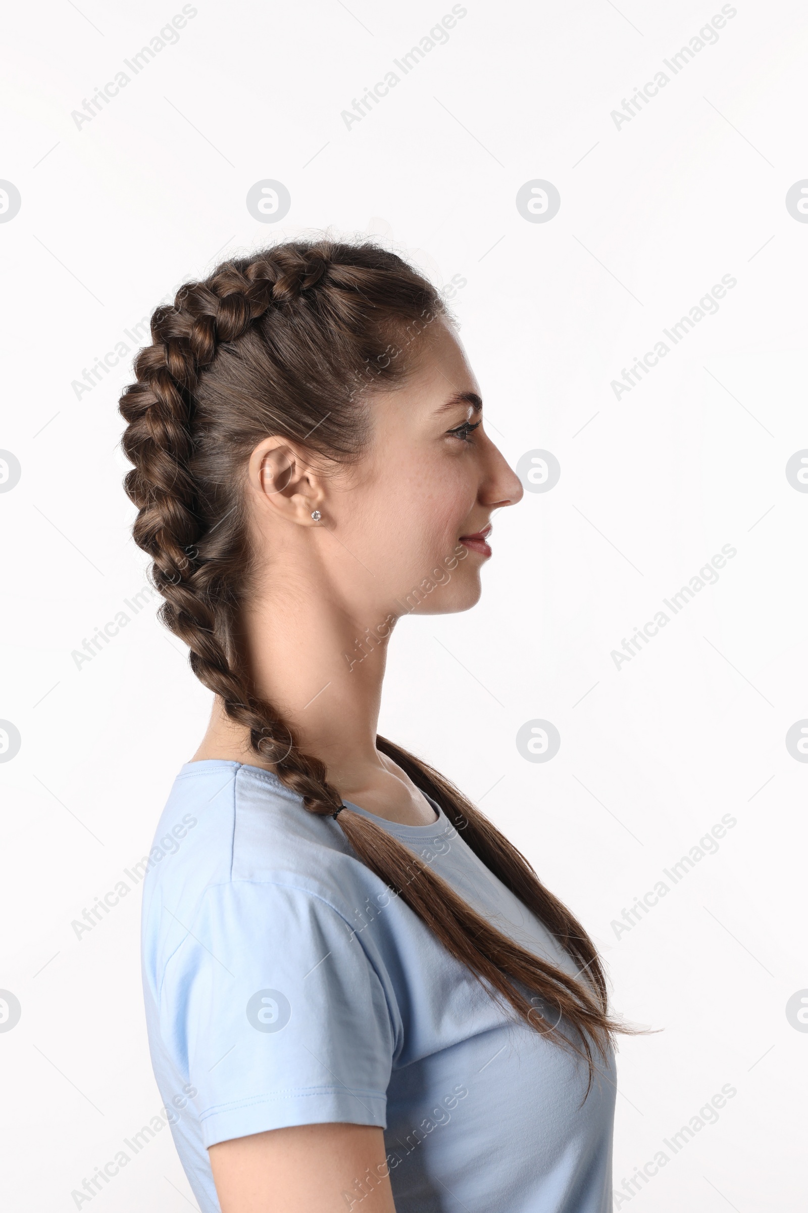 Photo of Woman with braided hair on light background