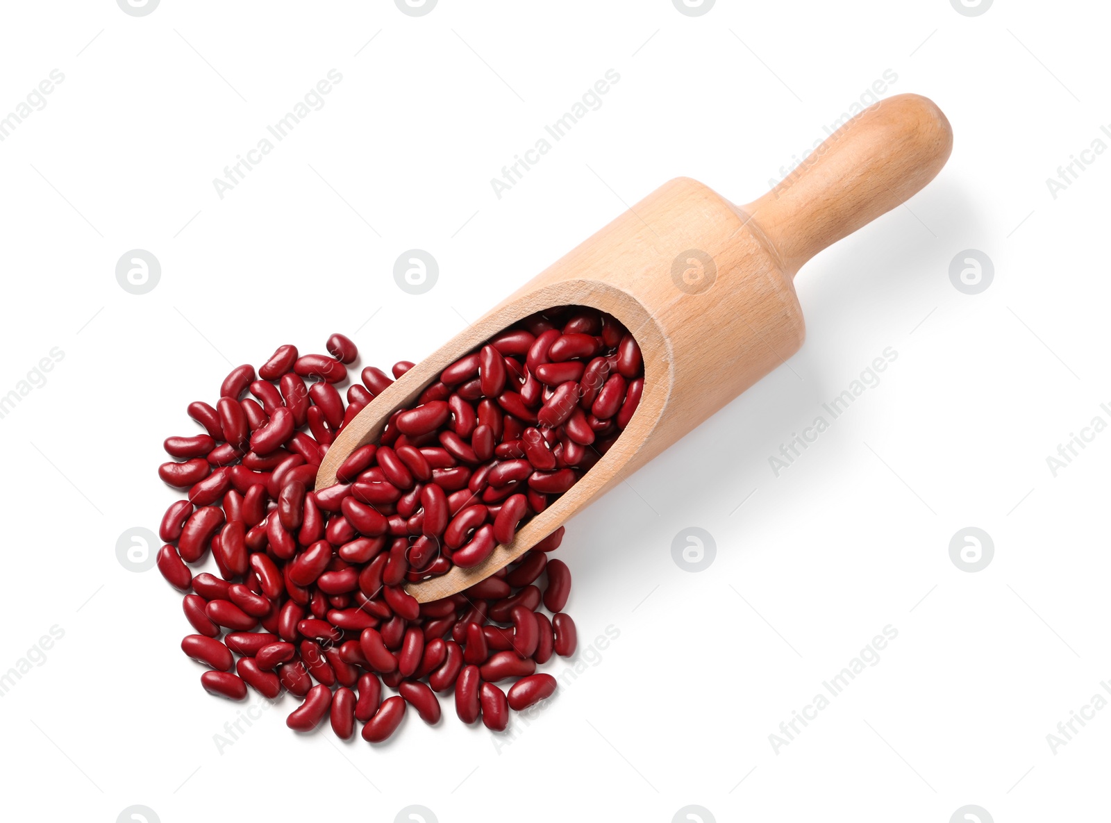 Photo of Wooden scoop with raw red kidney beans on white background, top view