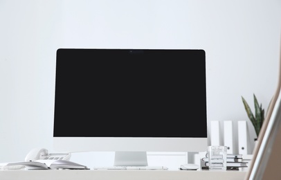 Photo of Stylish workplace with modern computer on desk