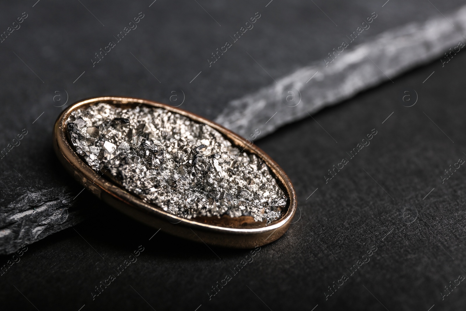 Photo of Stylish brooch on black background, space for text. Luxury jewelry