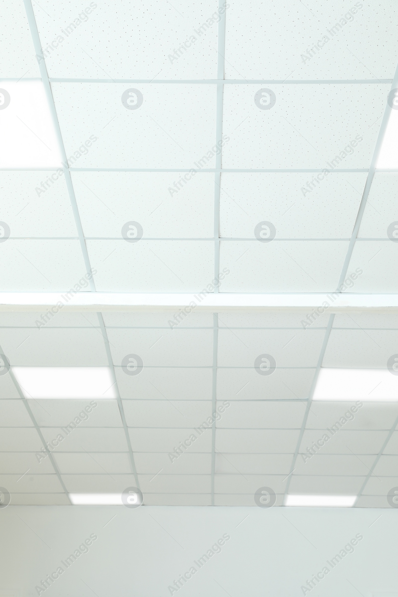 Photo of White ceiling in office room. Interior design