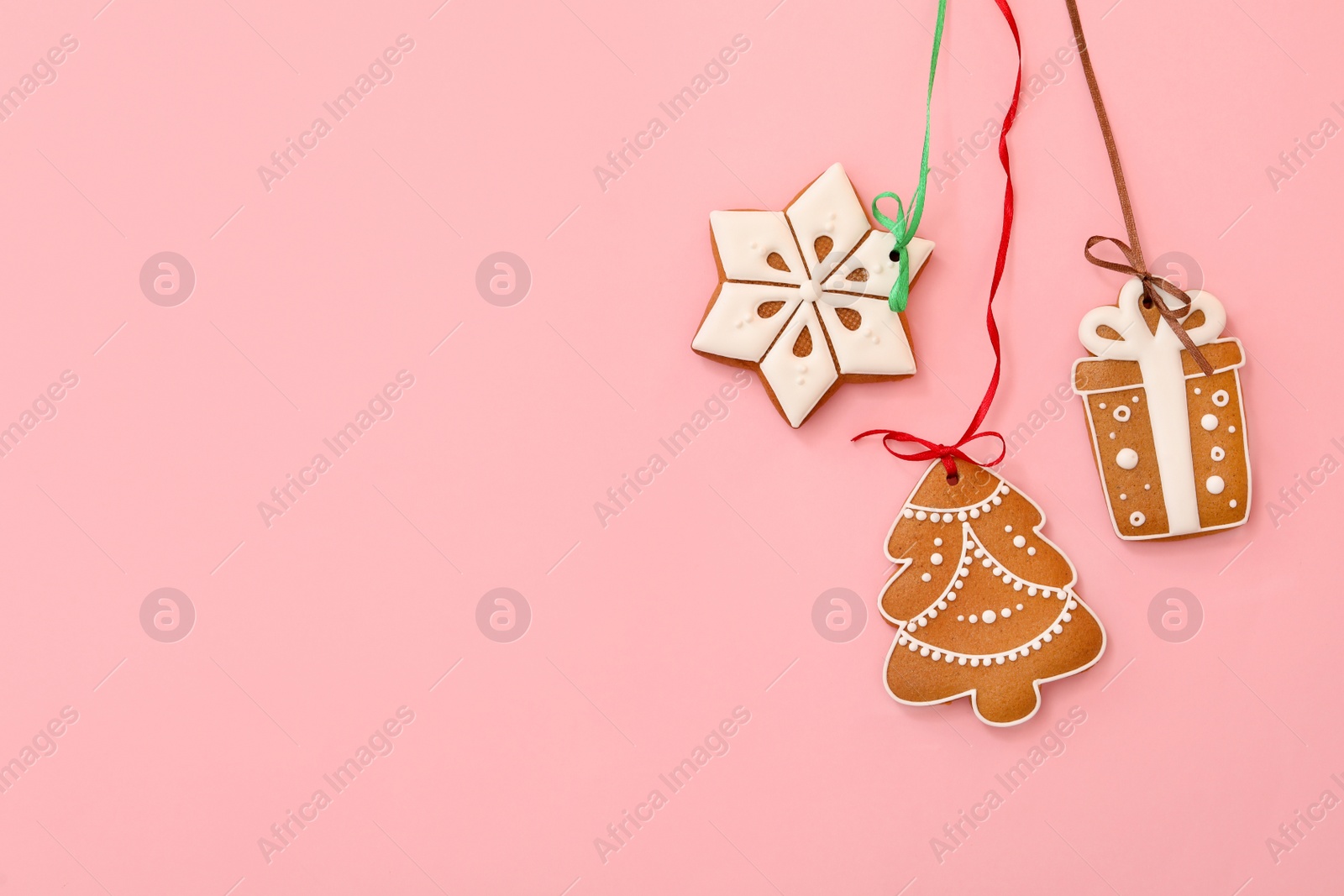 Photo of Different delicious Christmas cookies on pink background, flat lay. Space for text