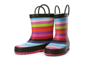 Photo of Colorful children's rubber boots on white background