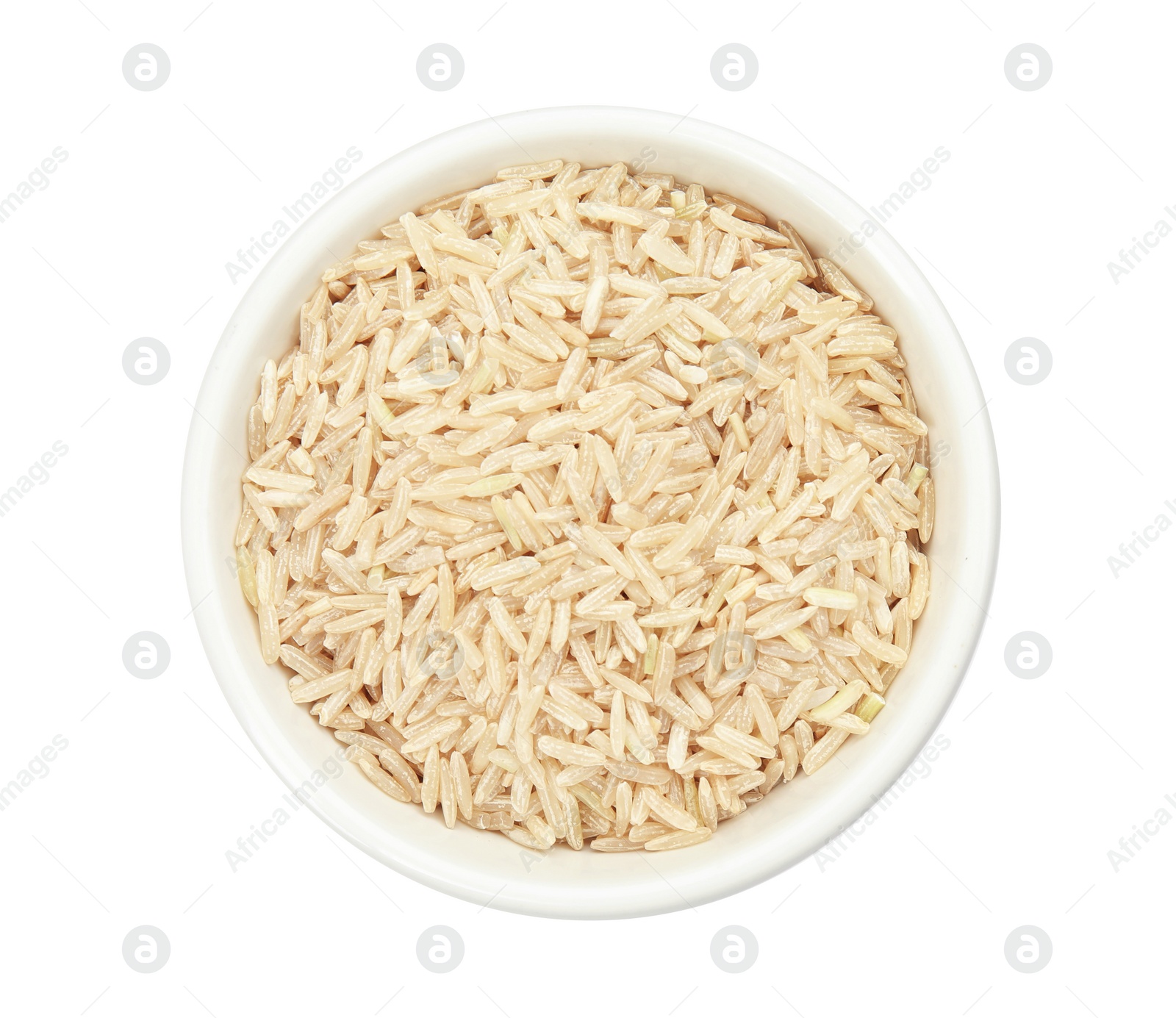 Photo of Bowl with raw unpolished rice on white background, top view