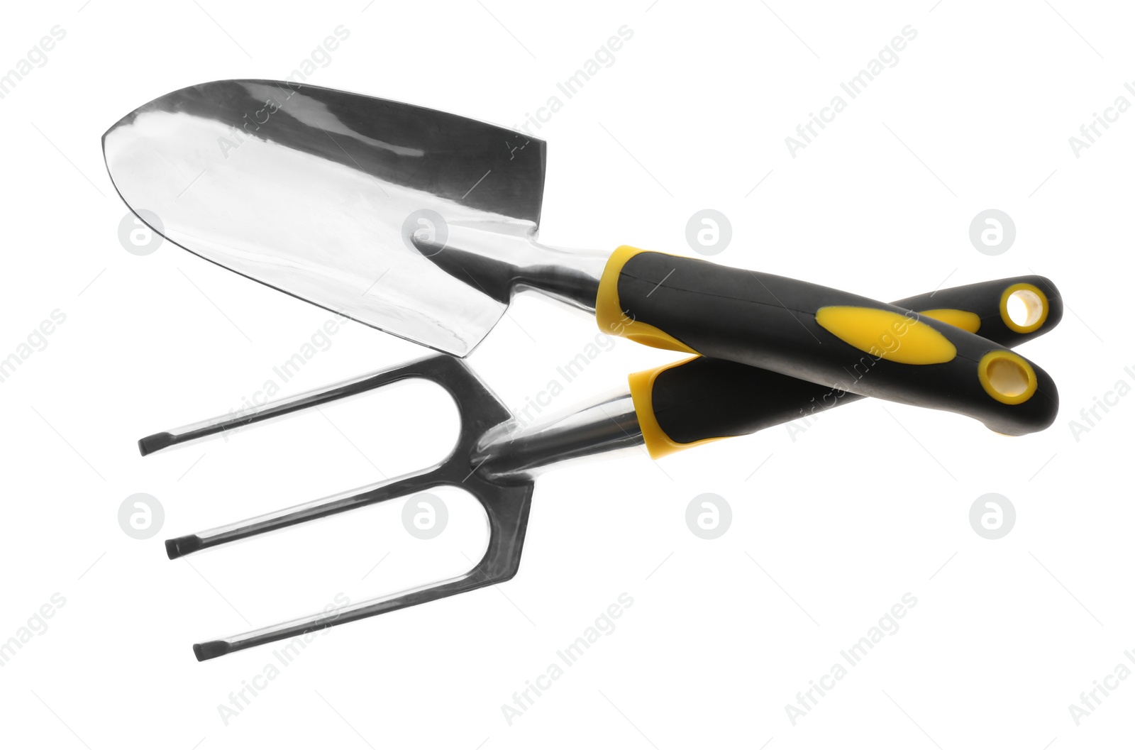 Photo of Trowel and pitchfork on white background, top view. Gardening tools