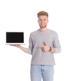 Photo of Happy man with laptop on white background. Space for text