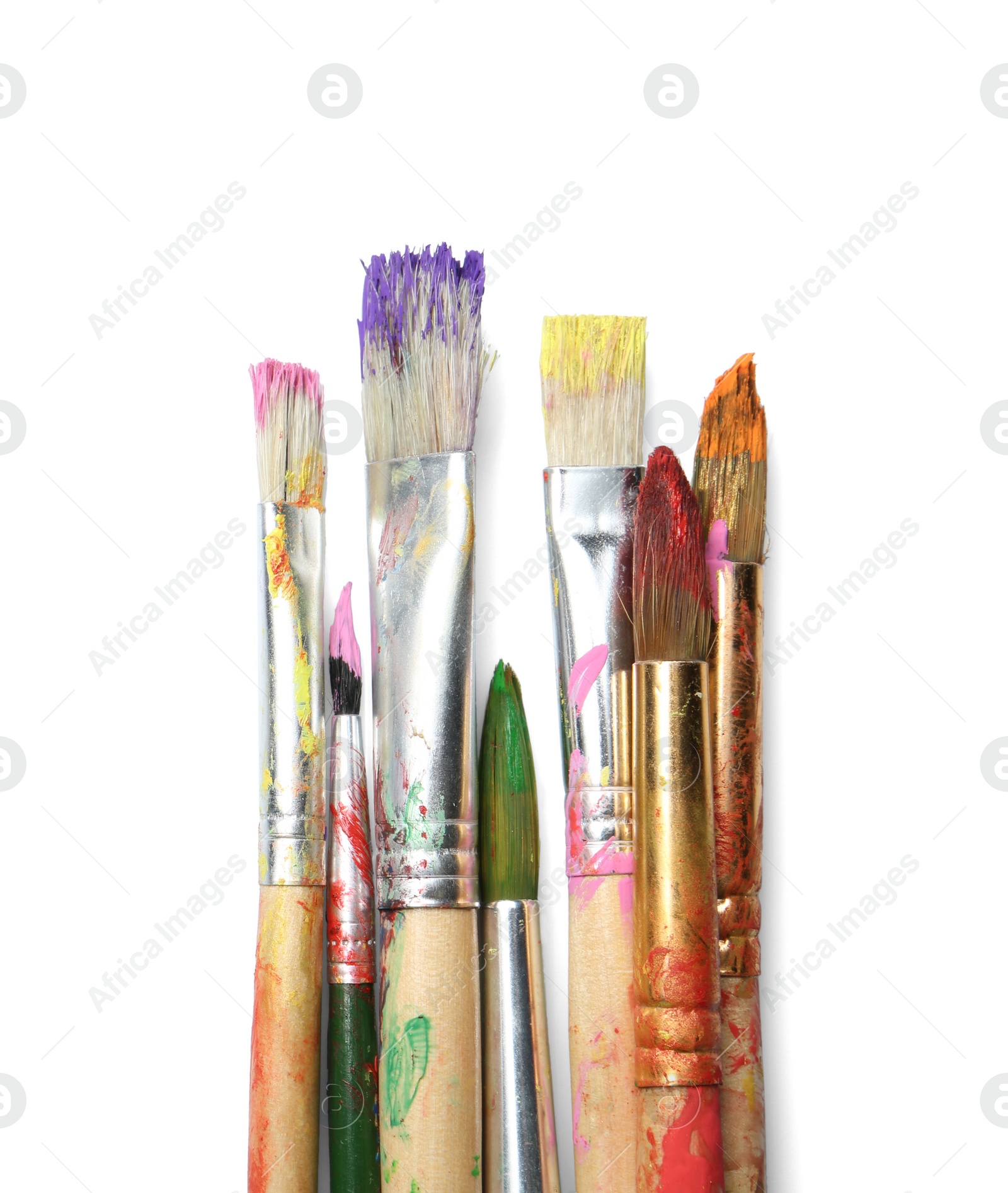 Photo of Different paint brushes on white background, top view