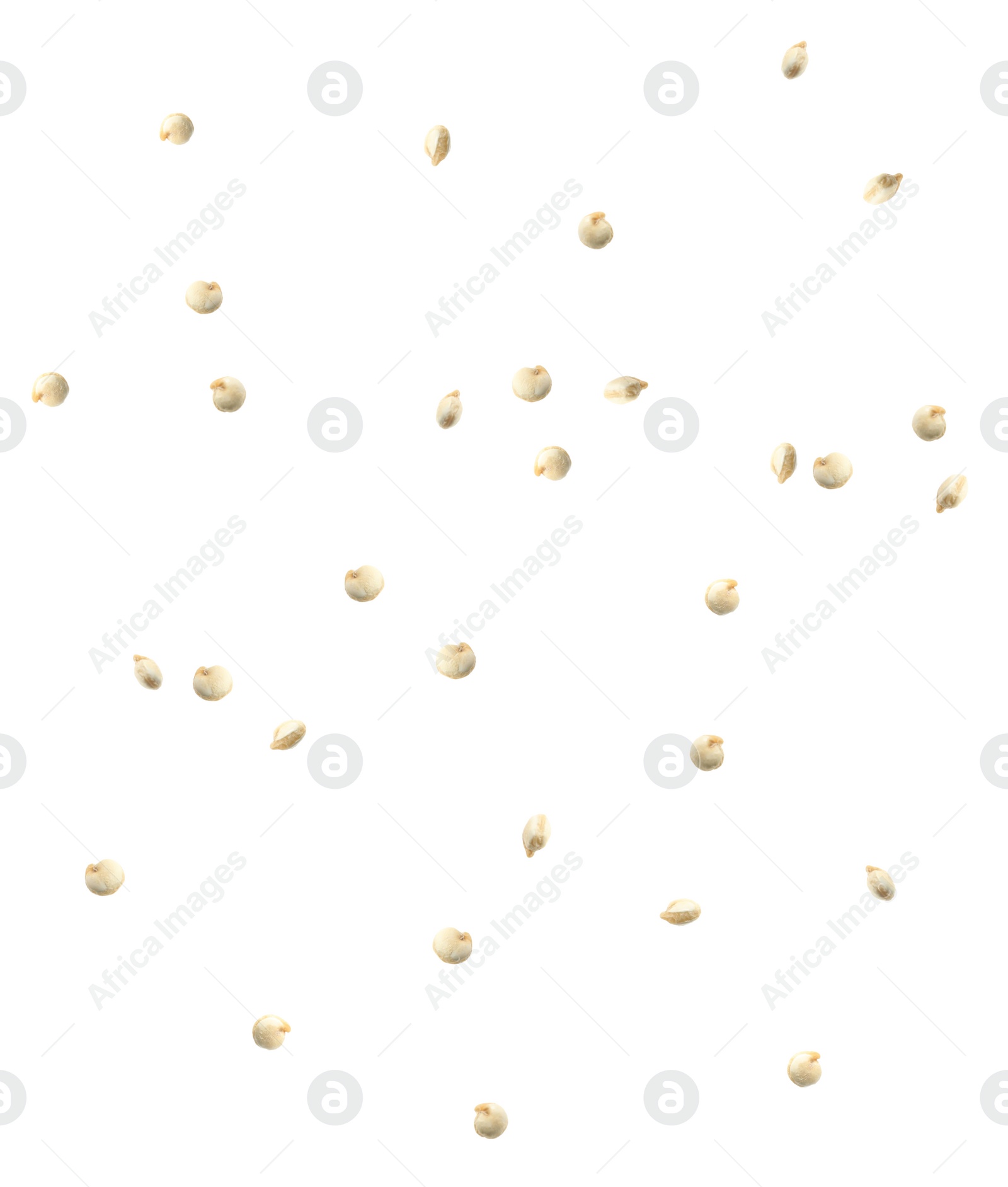 Image of Many quinoa seeds falling on white background. Vegan diet  