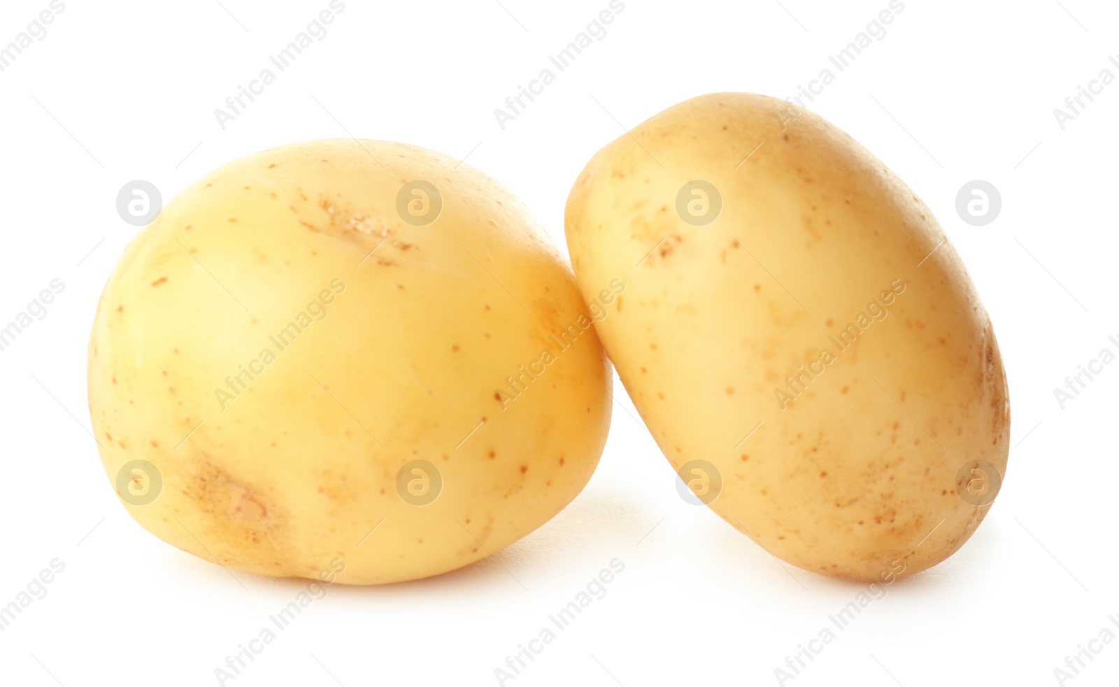 Photo of Fresh raw organic potatoes on white background