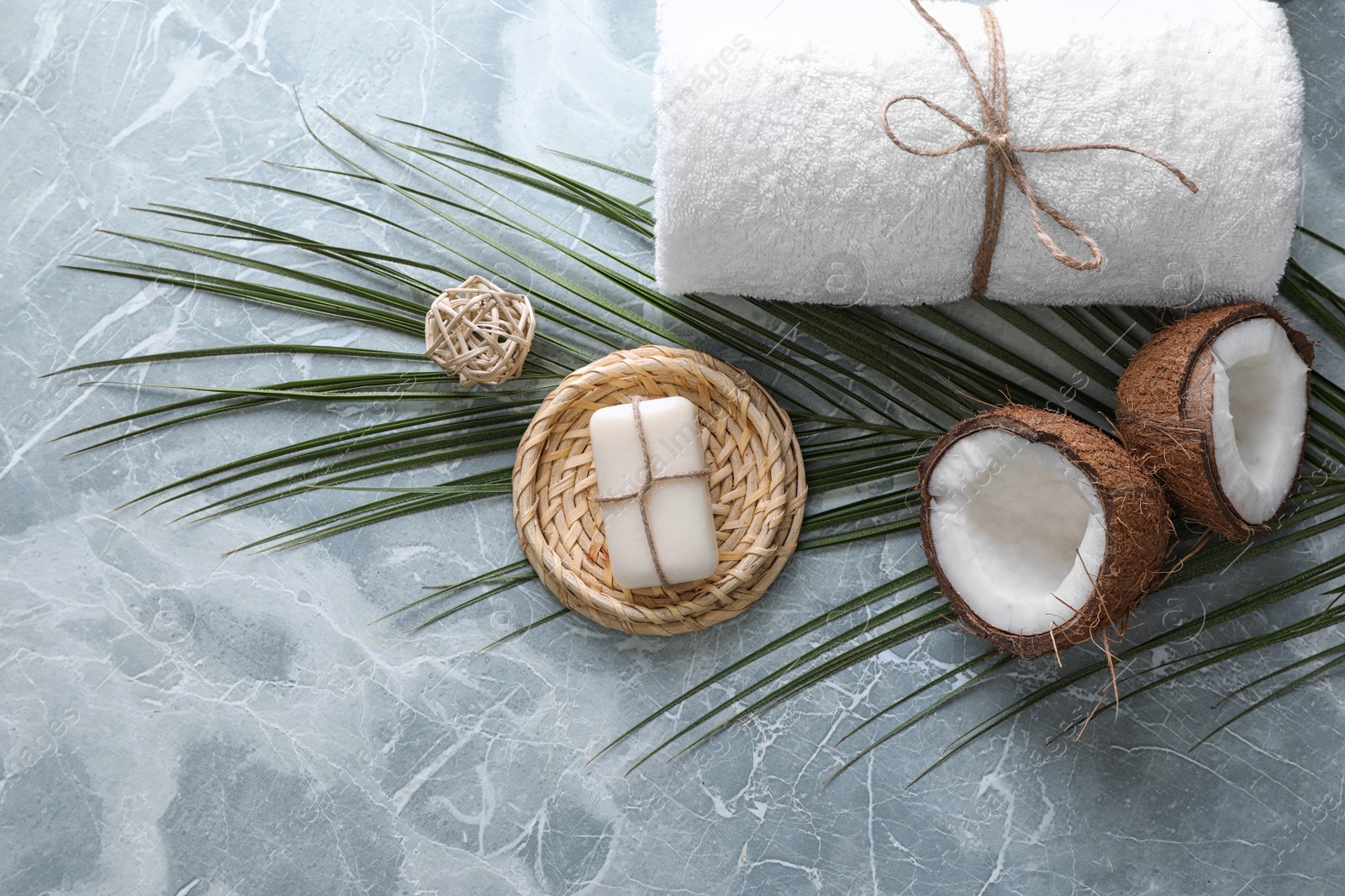 Photo of Flat lay composition with soap on light grey marble background