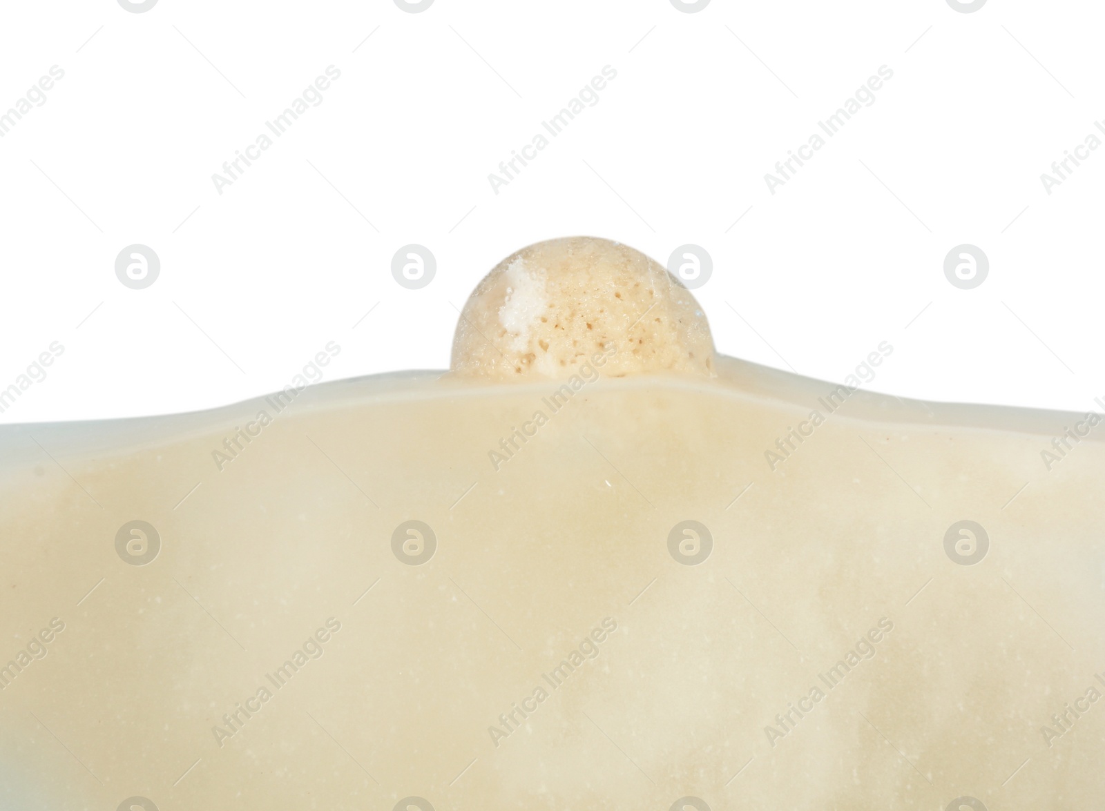 Photo of Bath bomb in water on white background