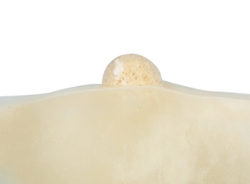 Photo of Bath bomb in water on white background