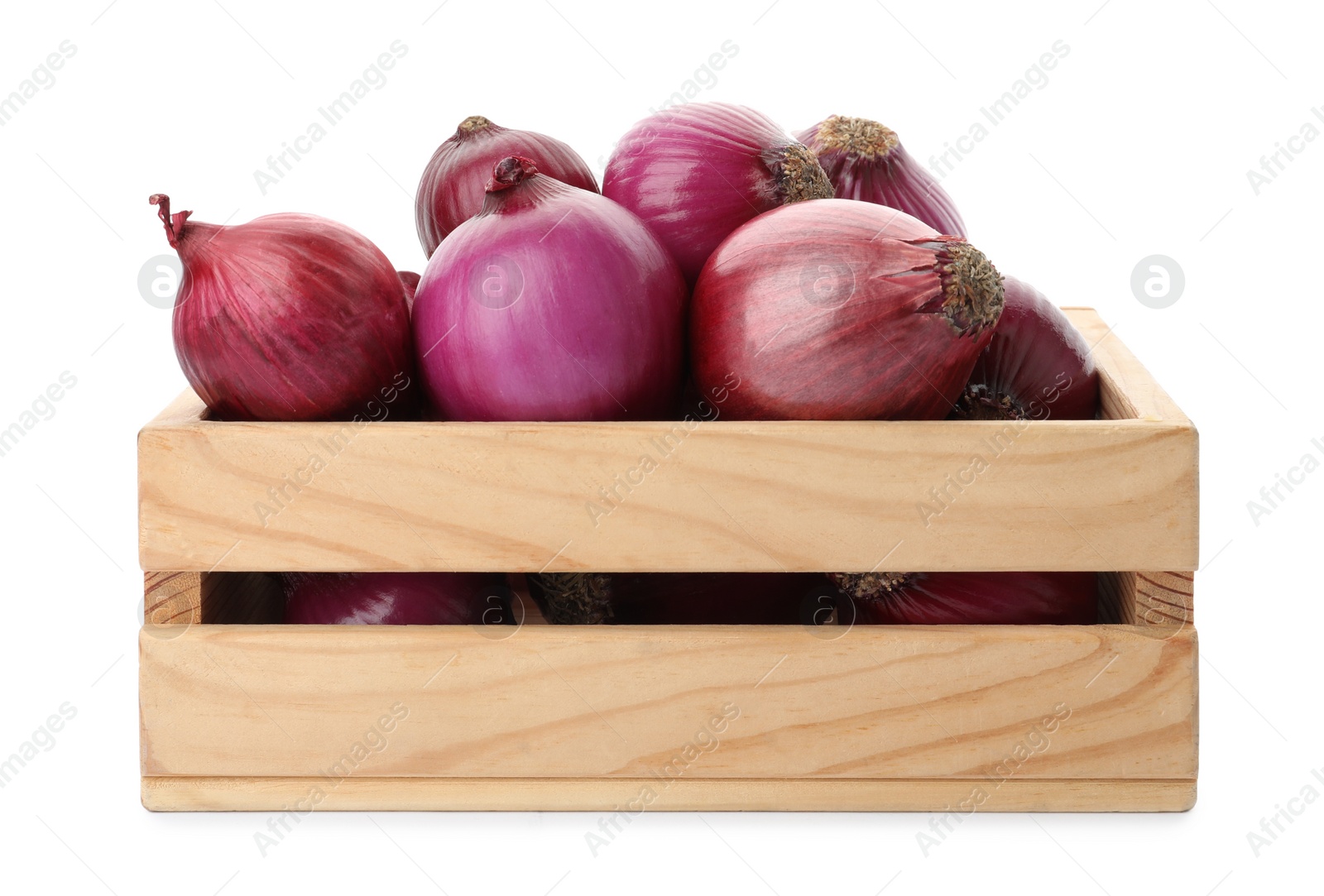 Photo of Ripe red onions in wooden crate isolated on white