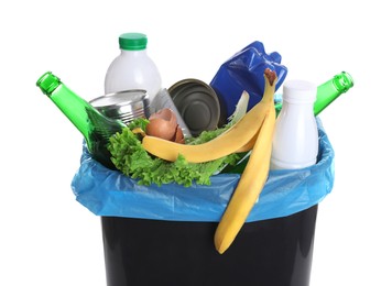 Photo of Trash bin full of garbage on white background, closeup. Recycling rubbish