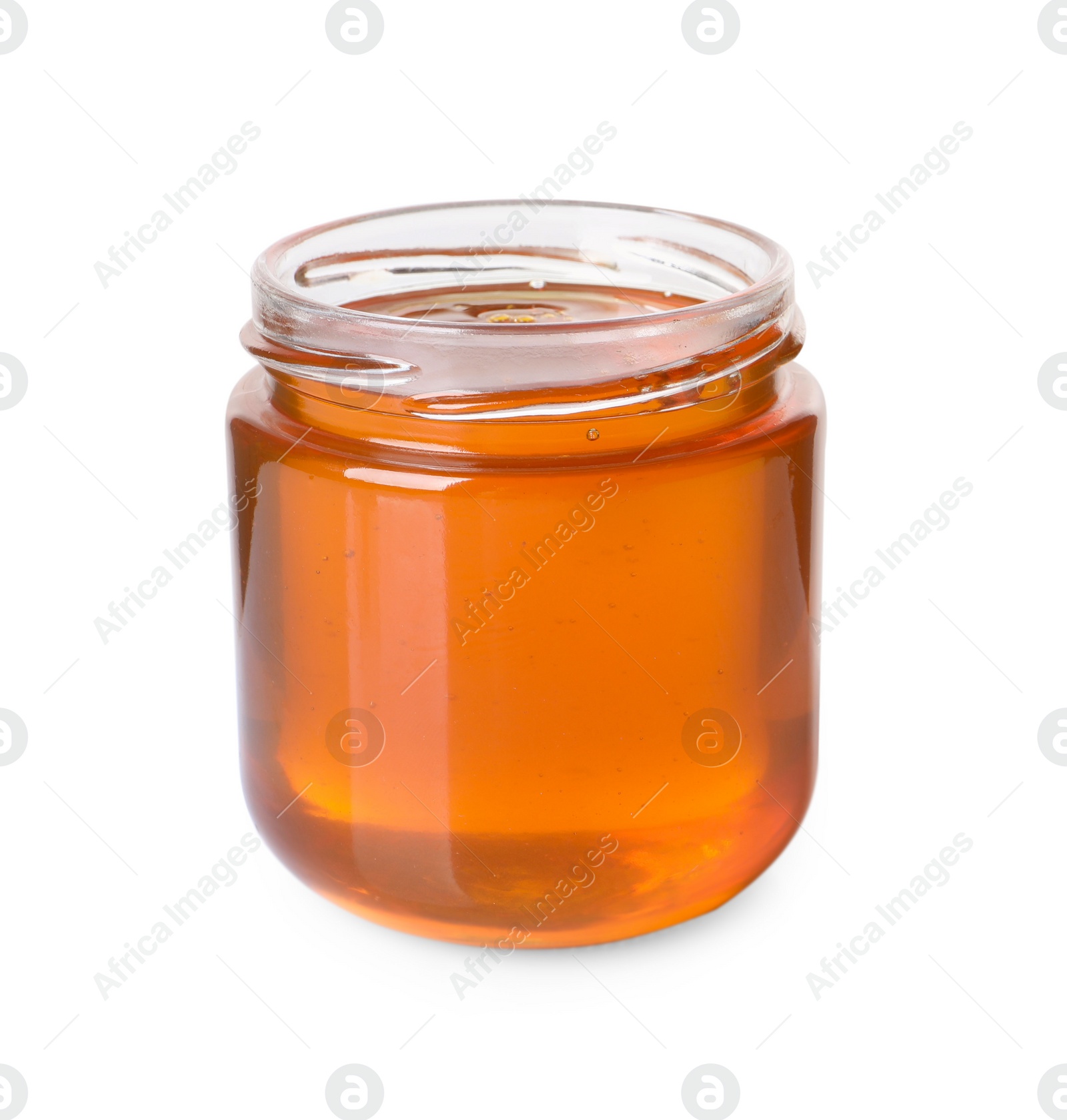 Photo of Tasty natural honey in glass jar isolated on white