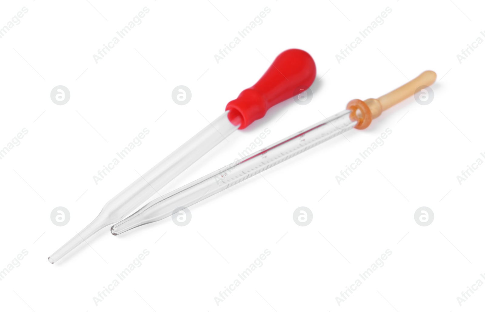 Photo of Two glass clean pipettes isolated on white