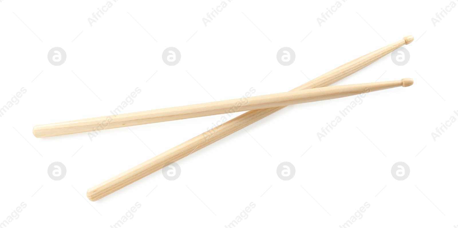 Photo of Drumsticks on white background, top view. Musical instrument