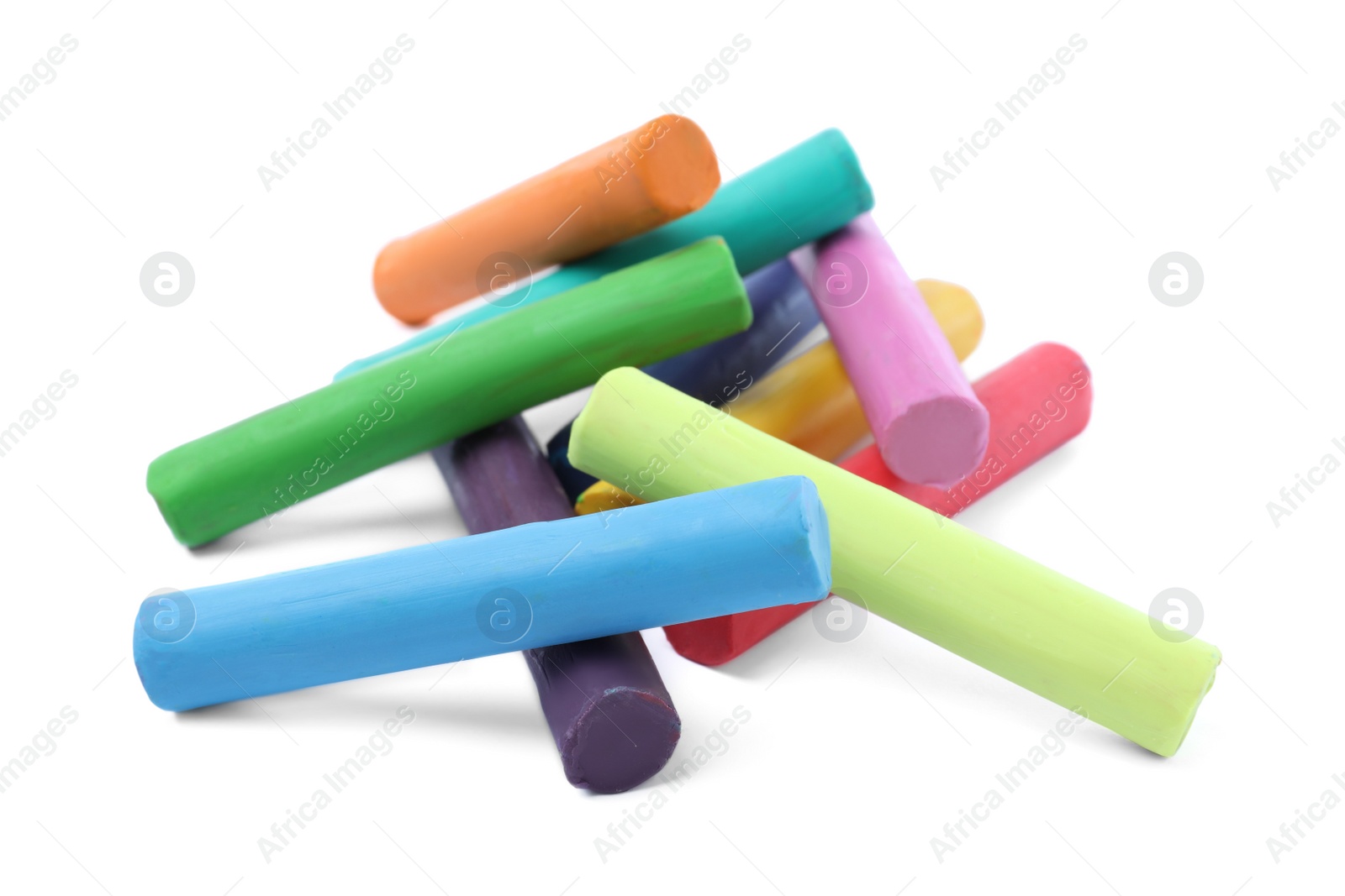 Photo of Many different colorful plasticine pieces on white background