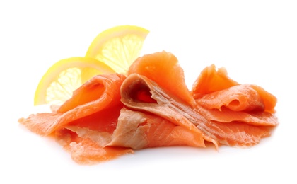 Photo of Fresh sliced salmon fillet with lemon on white background