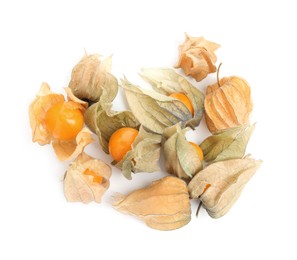 Ripe physalis fruits with dry husk on white background, top view