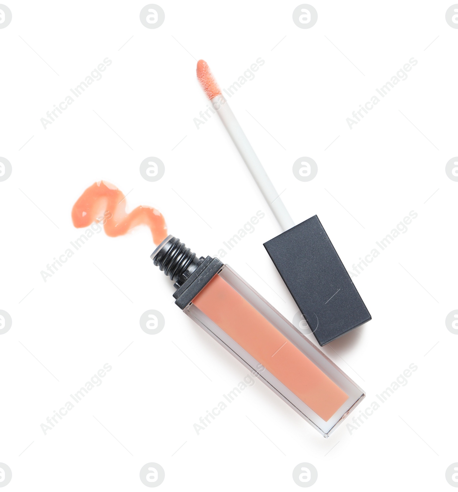 Photo of Beige liquid lipstick with smear and applicator isolated on white, top view
