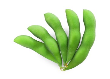 Raw green edamame pods on white background, top view