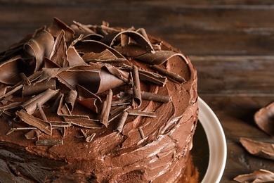 Tasty homemade chocolate cake on plate, closeup