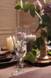 Photo of Elegant table setting with beautiful floral decor