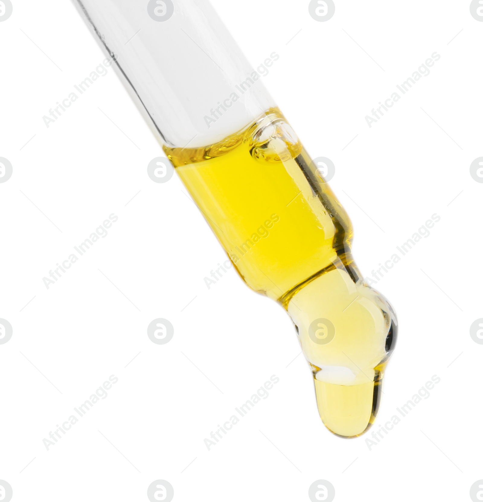 Photo of Dripping tincture from pipette isolated on white