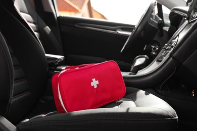Photo of First aid kit with medicaments inside car