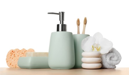 Photo of Bath accessories. Different personal care products and flower on wooden table against white background