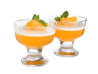 Photo of Delicious tangerine jelly with mint on white background