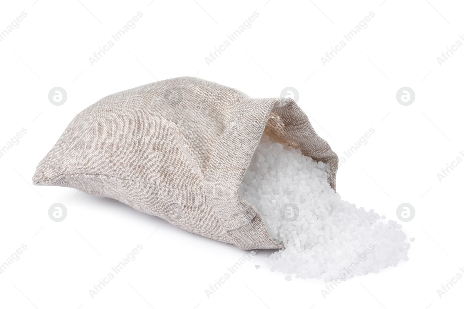 Photo of Bag of natural sea salt with scoop isolated on white