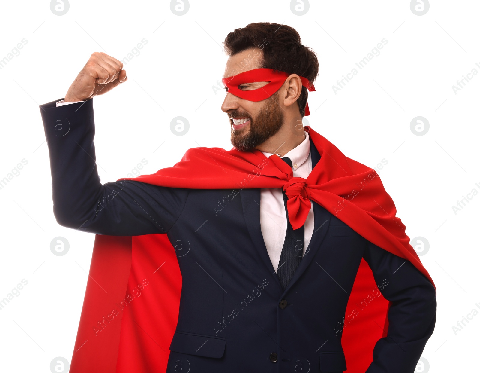 Photo of Happy businessman wearing red superhero cape and mask on white background