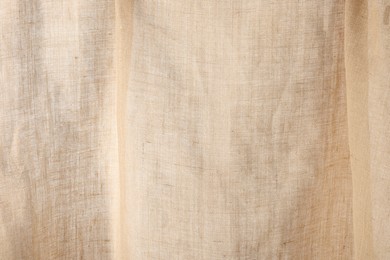 Texture of natural burlap fabric as background, closeup