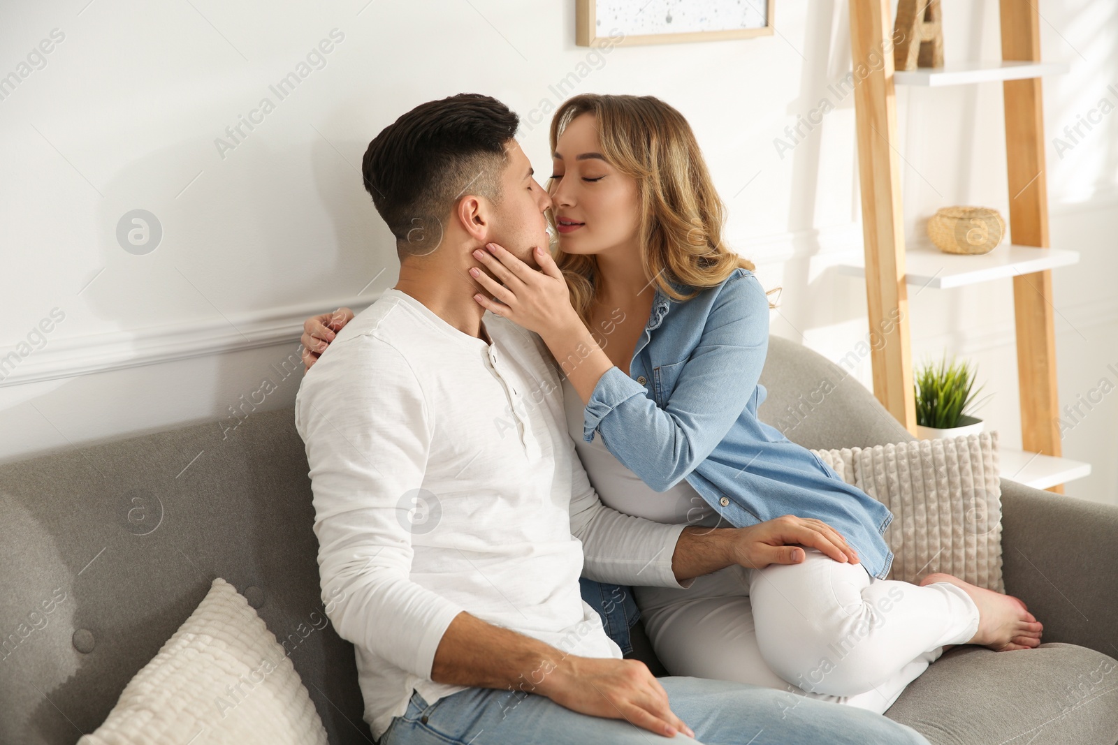 Photo of Lovely couple enjoying time together at home