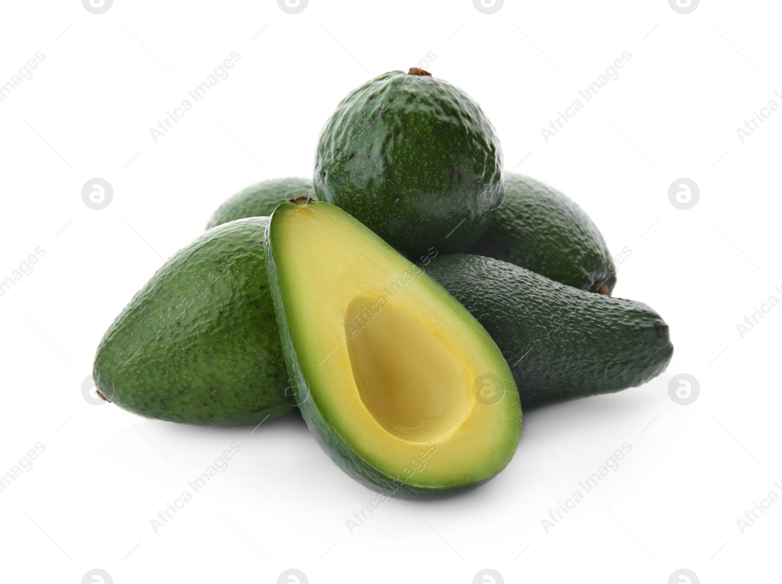 Photo of Ripe avocados on white background. Tropical fruit