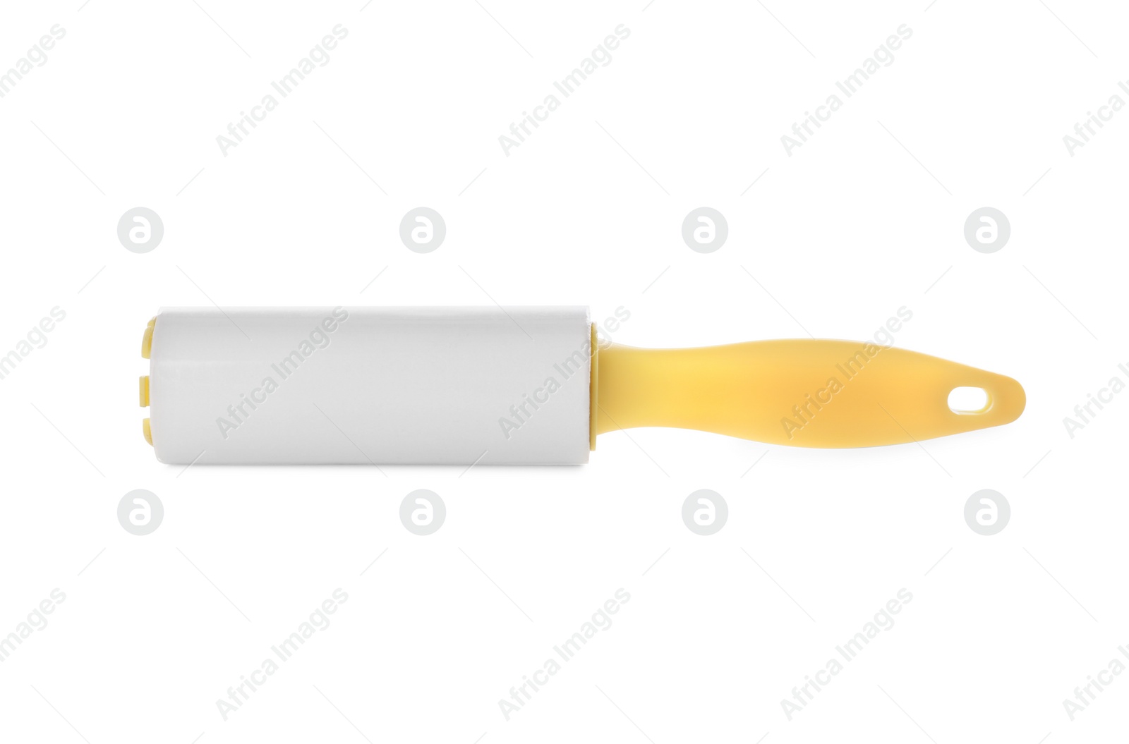 Photo of New lint roller with yellow handle isolated on white