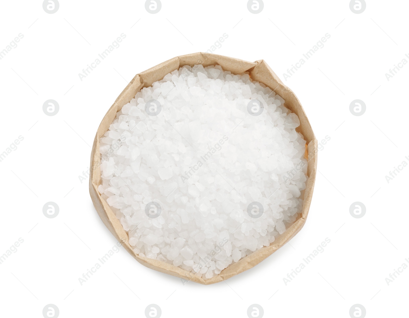 Photo of Natural salt in paper bag isolated on white, top view