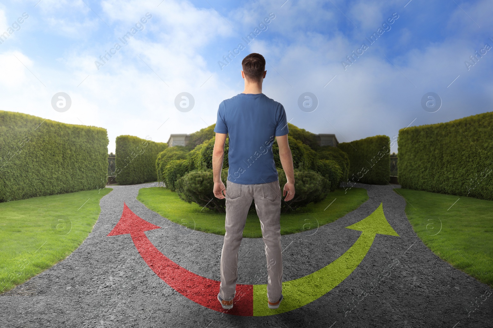 Image of Man standing at crossroads. Concept of choice between different ways 