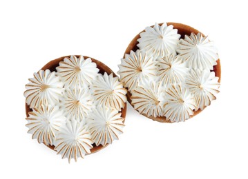 Photo of Tartlets with meringue isolated on white, top view. Tasty dessert