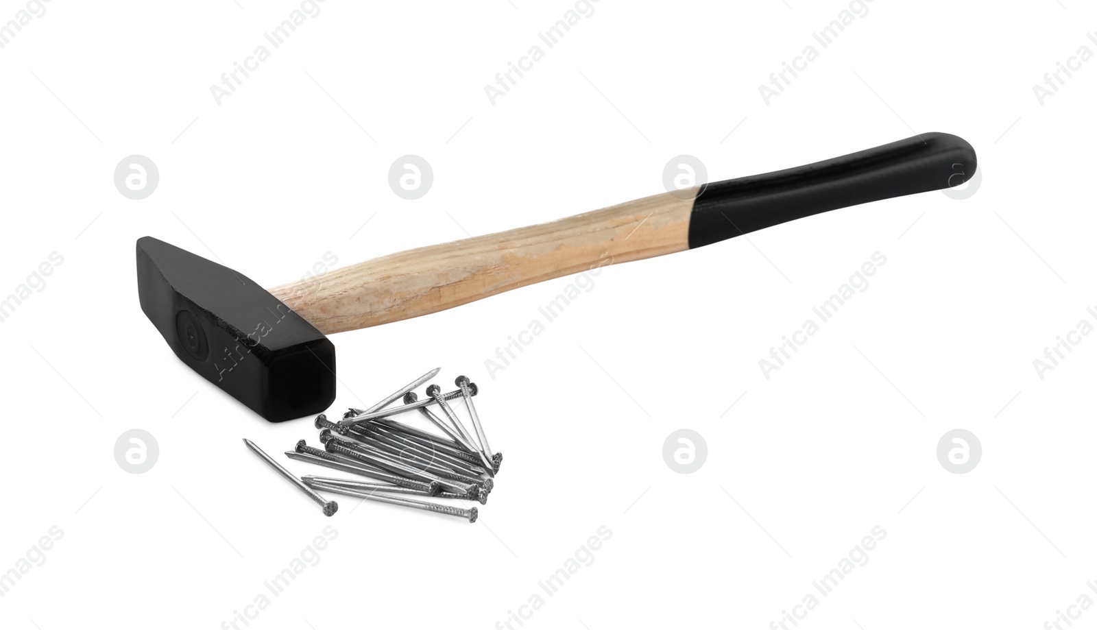 Photo of Hammer and metal nails on white background