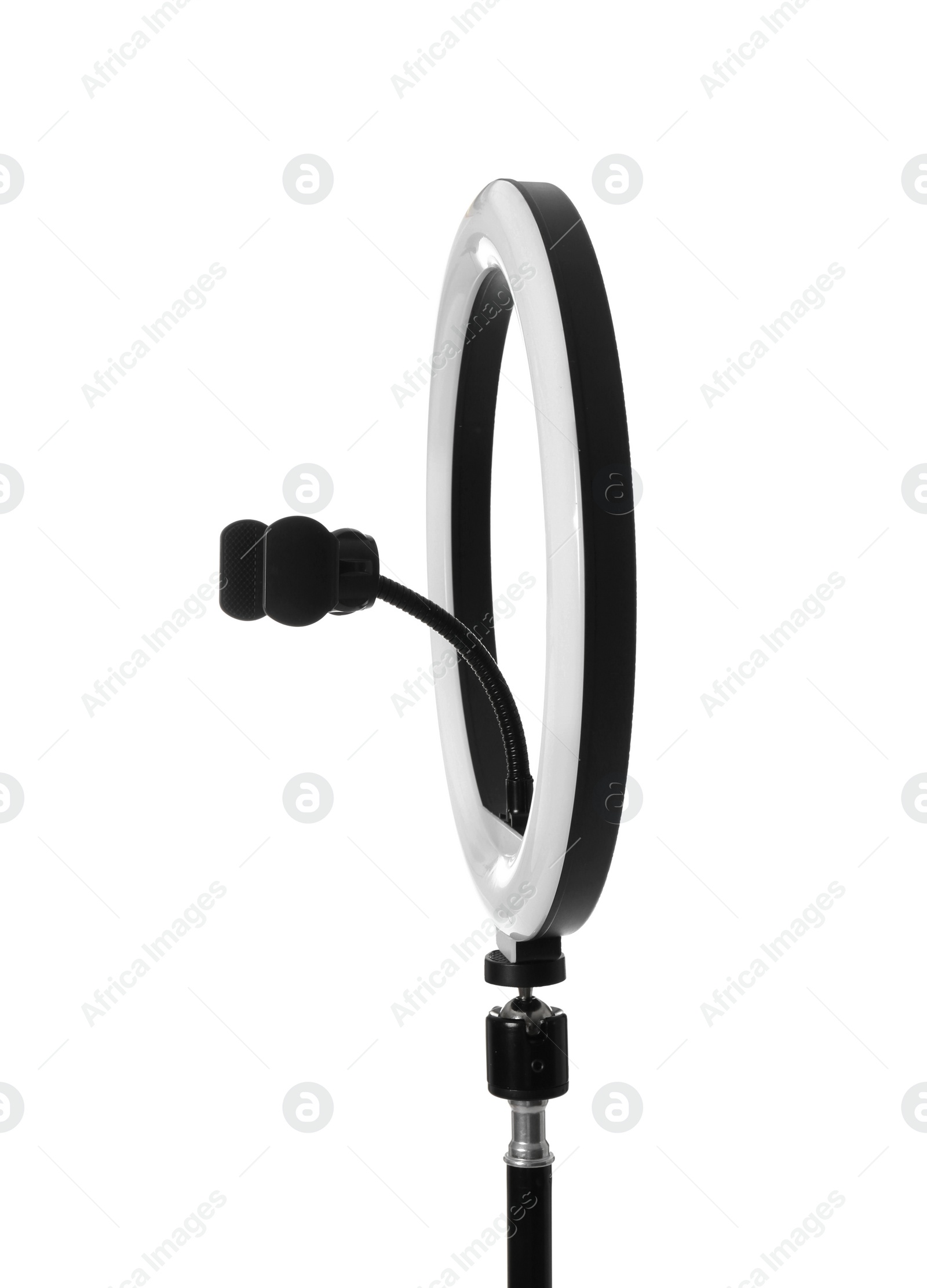 Photo of Modern ring light on stand against white background