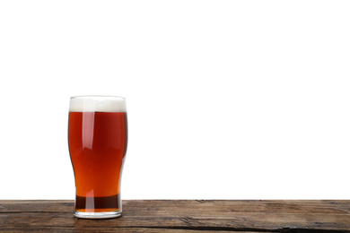 Photo of Glass of delicious kvass on wooden table, white background