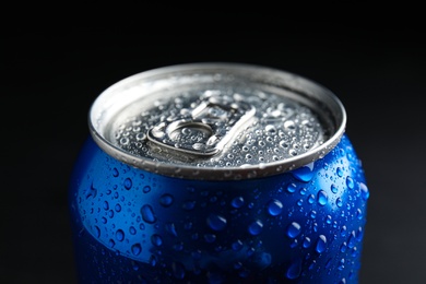Photo of MYKOLAIV, UKRAINE - FEBRUARY 08, 2021: Can of Pepsi with water drops on dark background, closeup