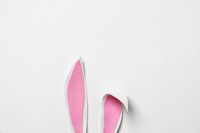 Funny Easter bunny ears on white background, top view