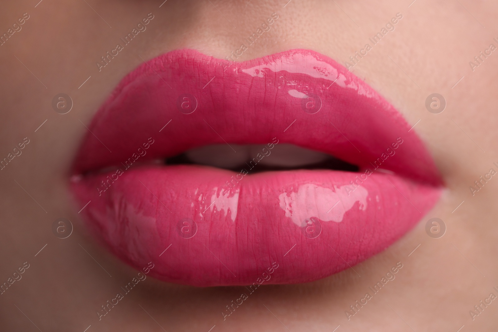 Photo of Young woman with perfect lips makeup, closeup