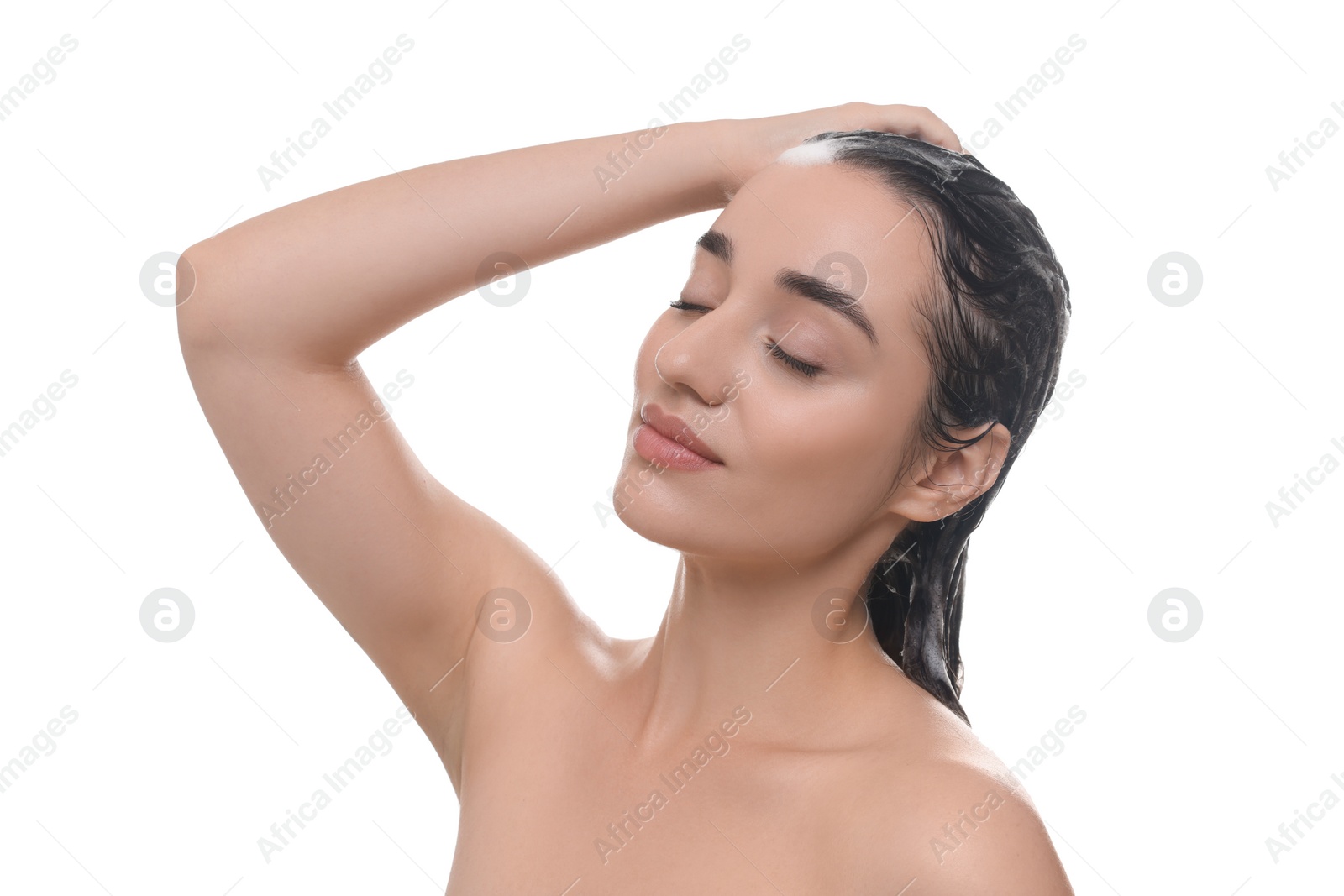 Photo of Beautiful woman washing hair on white background