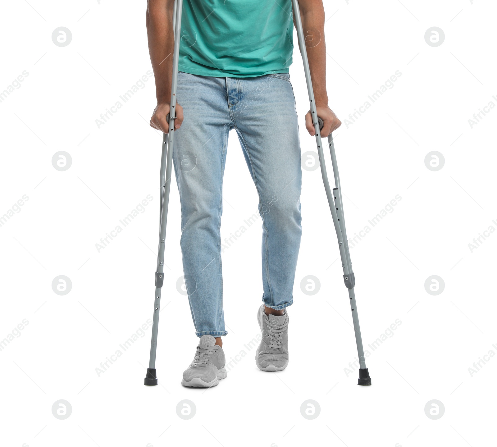 Photo of Man with crutches on white background, closeup